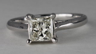 A lady's 18ct white gold dress ring set a square Princess cut  diamond, approx 0.90ct
