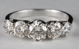 An 18ct white gold dress ring set 5 diamonds, approx 1.44ct