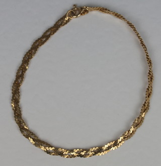 A gold twist bracelet