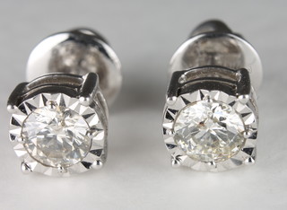 A pair of 18ct gold earrings set diamonds, approx 1.36ct