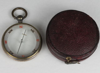 A compass by Dollond of London contained in a leather carrying  case