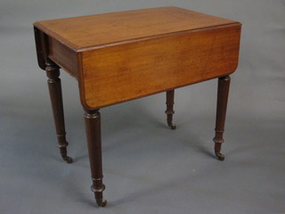 A Victorian bleached mahogany Pembroke table fitted a drawer,  raised on turned supports 29"