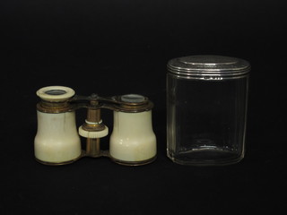 A pair of ivory and gilt mounted opera glasses, f, and an oval  panel cut dressing table jar with silver lid