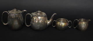 A silver plated 4 piece hotelware tea service comprising teapot, hotwater jug, cream jug and sugar bowl