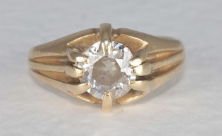 An 18ct gold gypsy ring set a large diamond