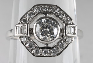 An 18ct white gold dress ring set diamonds surrounded by  diamonds, approx 0.90ct