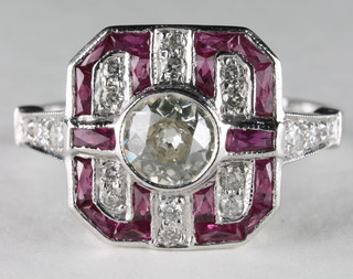 A lady's Art Deco style 18ct white gold dress ring set a rubies  and diamonds