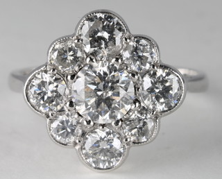 A lady's 18ct white gold cluster dress ring set 9 diamonds approx  1.85ct