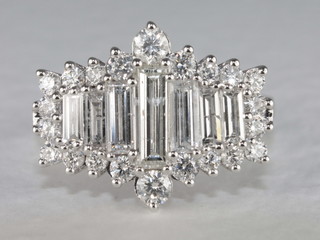 An 18ct white gold dress ring set baguette diamonds, approx 1.82ct,