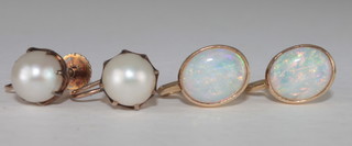 A pair of 9ct gold earrings set opals together with a pair of pearl  earrings