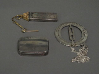 A silver match box, a curious silver and gilt metal calendar  pendant and a silver armillary sphere pendant