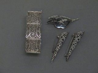 A filigree bracelet, 2 corsage holders and a niello brooch