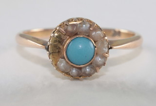 A gold dress ring set turquoise and demi-pearls, some missing,