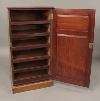 A Victorian mahogany press cabinet, fitted 6 trays enclosed by a panelled door by Jones Moss & Co, late Edwards & Sons, 25"