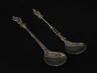 A pair of Continental white metal spoons