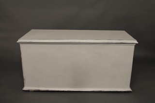 A painted coffer with hinged lid and iron handles 46"