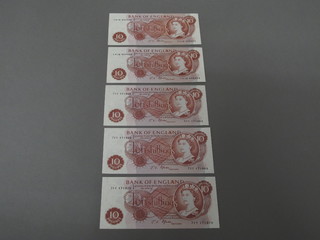 5 red 10 shilling notes