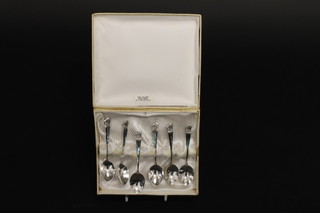 A set of 6 New Zealand Sterling silver and shell set coffee spoons, cased,