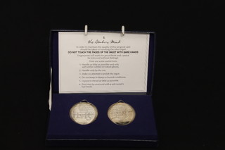 A pair of 1977 oval Silver Jubilee silver ingots, 2 1/2 ozs