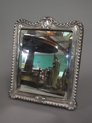 A bevelled plated easel mirror contained in a silver frame Chester 1901, 12" x 10"