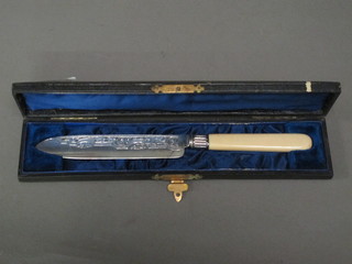 A Victorian silver bladed cake knife, Birmingham 1875, cased