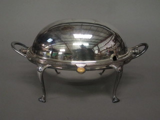 An oval silver plated roll top butter dish 13"