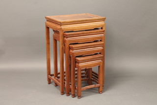 A quartetto of rectangular Oriental hardwood interfitting coffee  tables 19"