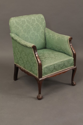 A 1930's Georgian style mahogany library chair with upholstered  seat and back raised on cabriole supports