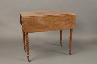 A 19th Century bleached mahogany Pembroke table fitted a  drawer, raised on turned supports 33"