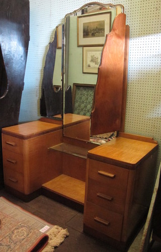 A Art Deco maple dressing chest with triple mirror above 6 short  drawers 47"