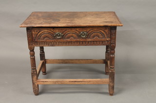 An 18th Century oak side table fitted a drawer raised on turned  and block supports 33"
