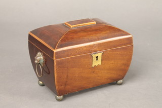 A 19th Century mahogany twin compartment tea caddy of  sarcophagus form and with brass drop handle, raised on bun feet  9"