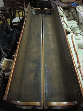 A pair of Victorian mahogany snooker observation benches, raised on turned and block supports, some old worm, 144"
