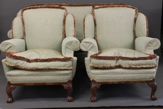 A Queen Anne style walnut show frame 3 piece suite comprising 3 seat settee, 2 matching armchairs upholstered in green material,  raised on cabriole supports