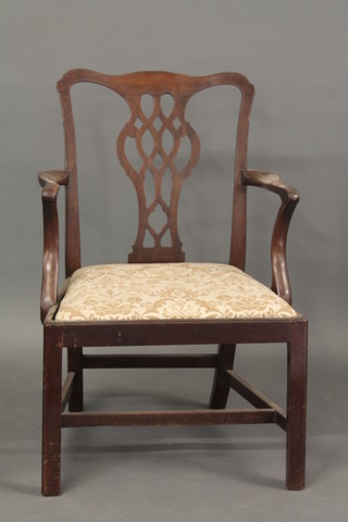 A 19th Century Chippendale style mahogany slat back carver  chair with upholstered drop in seat