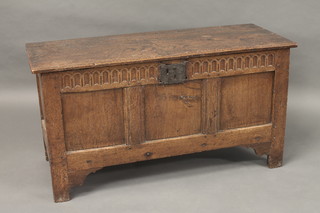 A 17th/18th Century oak coffer of panelled construction with hinged lid and iron lock, 42"
