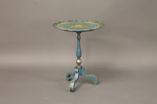 An oval shaped blue lacquered wine table raised on pillar and tripod supports 16"