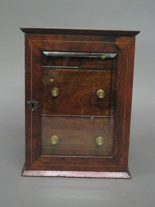 A Victorian rosewood cabinet fitted 2 short and 2 long drawers enclosed by bevelled plate glazed door 9"