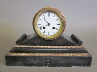 A Victorian French 8 day striking mantel clock with enamelled  dial and Roman numerals contained in a 2 colour marble case