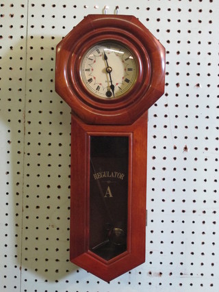 A Victorian style hanging 31 day regulator contained in a walnut case