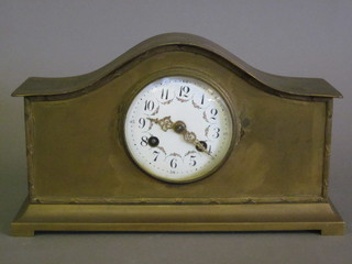 A French striking bedroom timepiece with enamelled dial and Arabic numerals contained in an arch shaped gilt case 10"