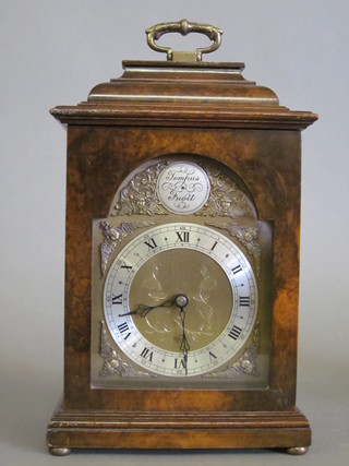 An Elliott Queen Anne style bracket clock with arched gilt dial  and silvered chapter ring, contained in a walnut case 6"   ILLUSTRATED