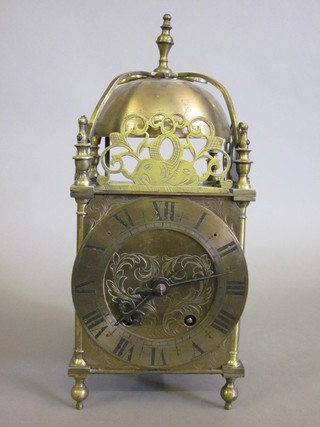 A 1930's 8 day striking lantern clock with brass dial and Roman  numerals 6"