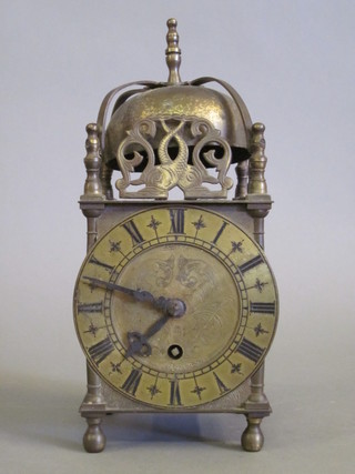 A Smiths lantern clock with brass case 4"