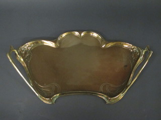 An Art Nouveau embossed brass twin handled tea tray 24"   ILLUSTRATED