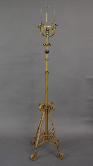 A 19th Century brass adjustable oil lamp