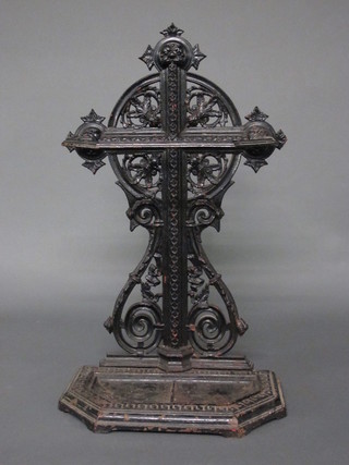 A Victorian style black painted pierced cast iron umbrella stand