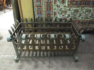 A rectangular wrought iron fire basket 22"