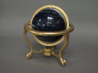A Franklin Mint terrestrial Globe set semi-precious stones contained in a gilt metal gimbal
