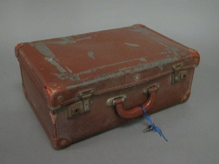 A small fibre suitcase
